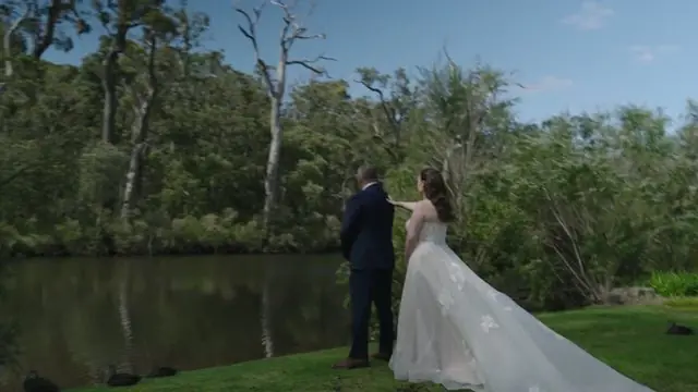 Wedding film still: couple beside the water at a Perth wedding venue