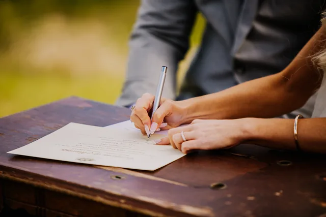Signing the marriage register at Riverbank Estate