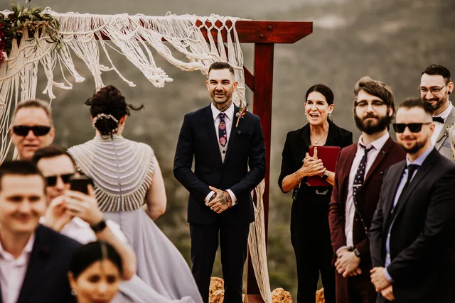 Intimate Perth Hills ceremony beneath a macrame arch