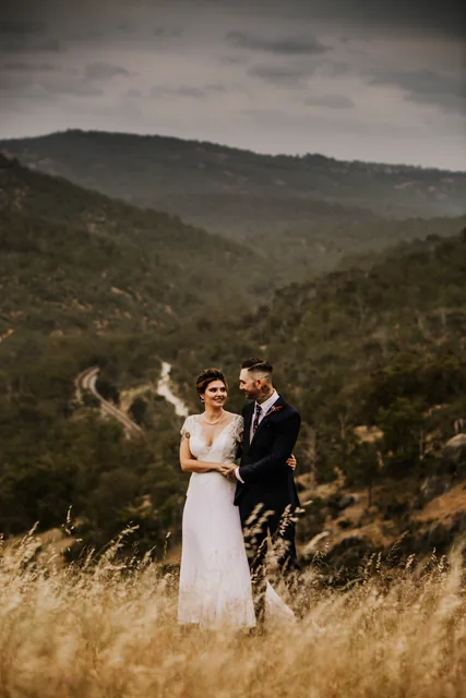 A couple standing in a wide Perth Hills valley