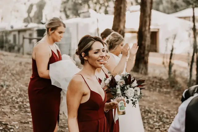 Bridesmaids celebrating after the ceremony