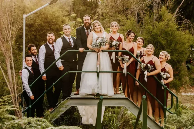 The bridal party on a green bridge in the Mundaring bush