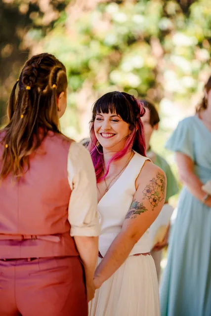 The two brides together during their ceremony