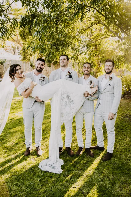 Groomsmen laughing together