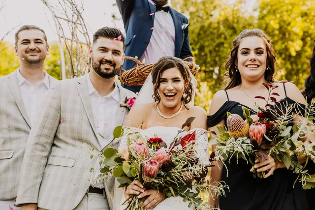 The couple with their bridal party at The Olive Estate